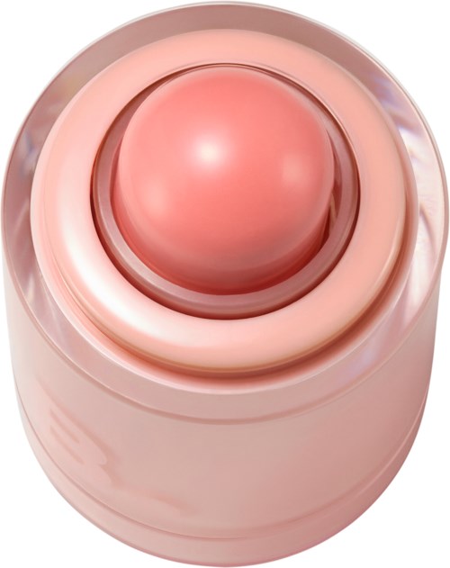 A pink, rounded cosmetic device with a smooth, shiny surface and a central dome, likely used for skincare.