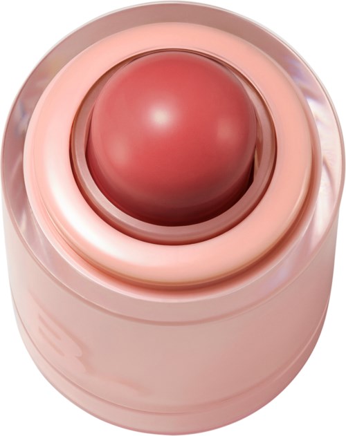 A pink device with a rounded top and a shiny, spherical center inside. It looks like a beauty or skincare tool.