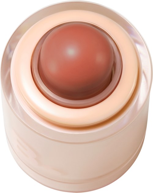 A round beauty product with a shiny, pinkish center inside a white container.
