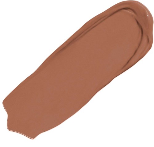 Beige-meikkinäytettä tai sivelyä, munanmuotoinen, sileä tekstuuri ja pyöristetyt reunat.