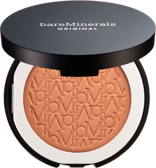 A round container with black lid and stand, filled with peach-colored powder embossed with words. Logo on lid.