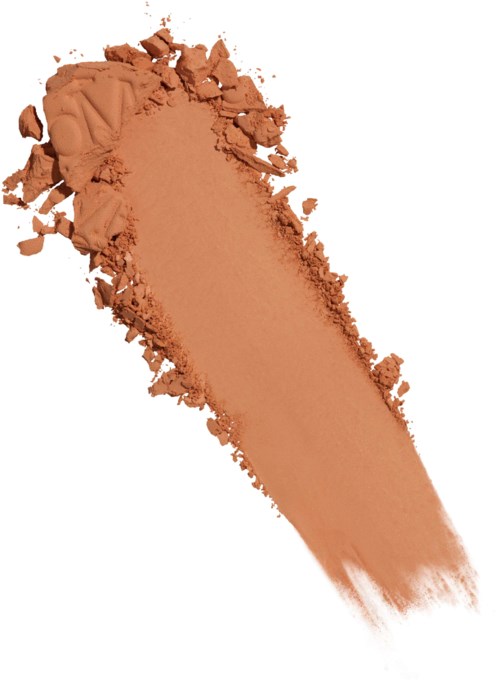 A smear of tan-colored powder with some crushed pieces at the top and a streak extending downward.