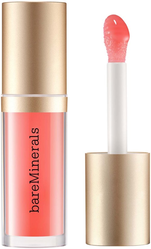 A lip gloss tube with a shiny gold cap, pink gloss inside, and a wand applicator. BareMinerals brand label on the tube.
