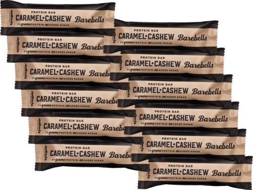 Several caramel cashew protein bars are stacked on each other, with black and brown packaging.