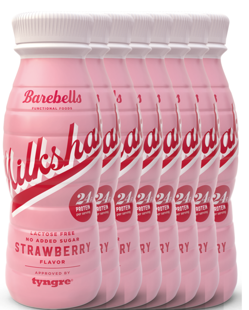 Six pink bottles of Milk-shake with strawberry flavor and protein, labeled 'Barebells' and 'tyngre'.