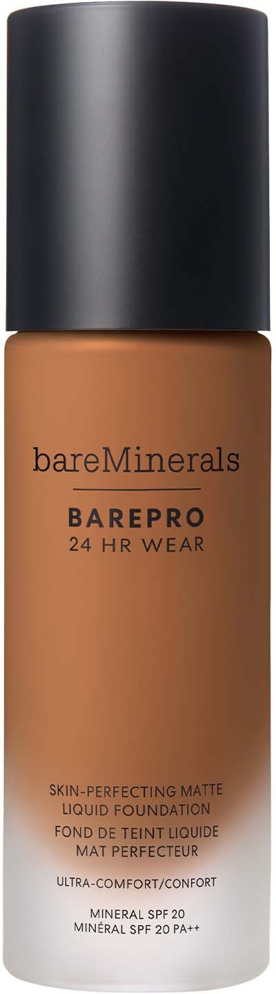 A bottle of bareMinerals BAREPRO liquid foundation with black cap and brown liquid inside.