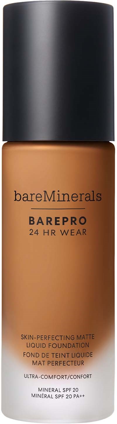 A bottle of bareMinerals BarePro liquid foundation with a black cap and beige liquid inside.