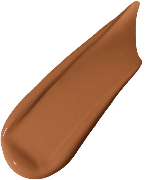 A dollop of smooth, brown chocolate spread with a pointed tip.