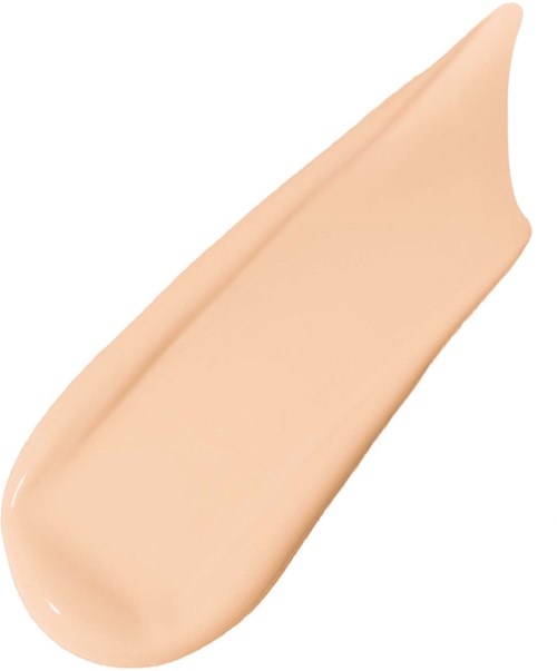 A beige moisturizer or foundation with a smooth, creamy texture and a pointed tip.
