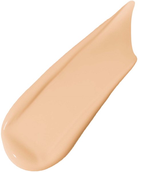 A sample of beige liquid foundation with a smooth, creamy texture and a slightly pointed tip.