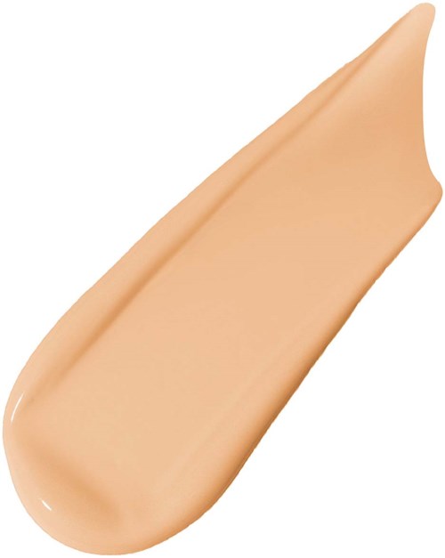 A beige liquid foundation with a smooth, creamy texture and a slightly pointed tip.