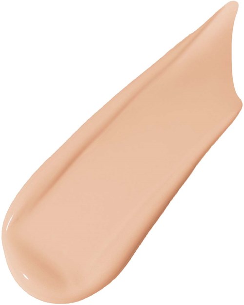 A beige liquid makeup swatch with a smooth texture and slightly pointed tip.