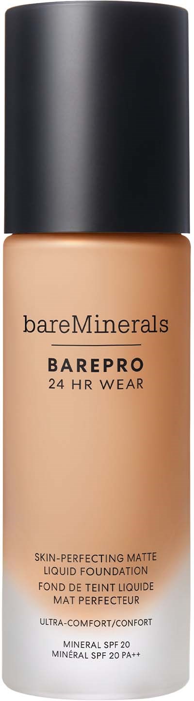 A bottle of BareMinerals BarePro liquid foundation with a black cap and beige body.