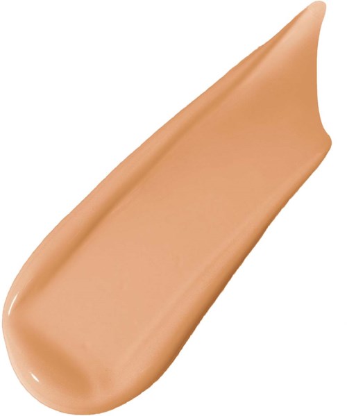 A tan-colored liquid foundation swipe with a peak at the top right.