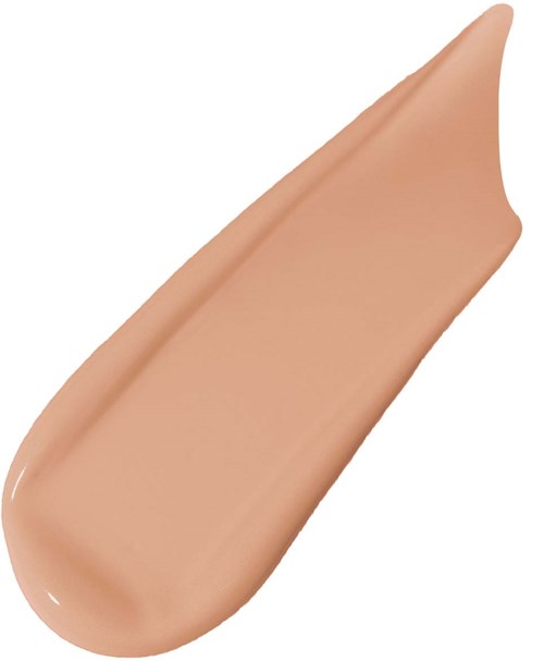 A beige-colored liquid makeup or foundation swatch with a smooth, slightly shiny texture.