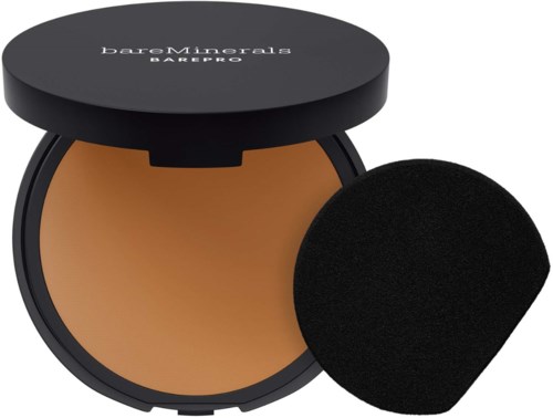 A compact powder case with a puff, labeled BareMinerals Barepro, contains foundation makeup.