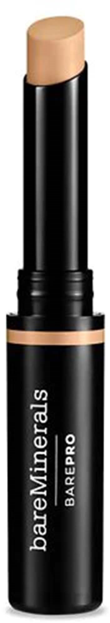 En beige sminkstav i ett svart fodral med etiketten 'bareMinerals BARE PRO'.