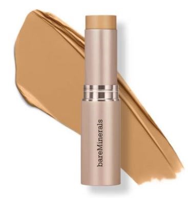 En beige BareMinerals sminkstift med en test av produkten bakom.