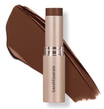 Kosmetisk stift i beige och brunt. BareMinerals-logga. Swatch av brunt smink.