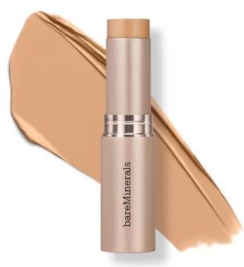 En beige BareMinerals-makeuppalett med ett lager foundation bakom.