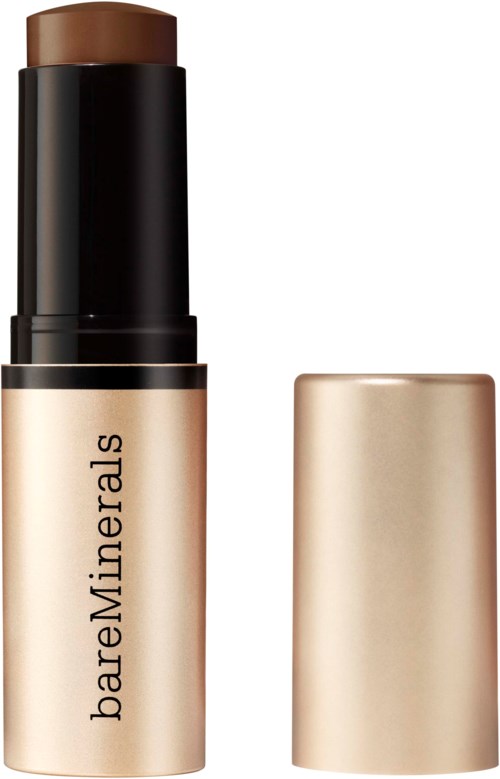 En beige och svart stift med lock, märkt bareMinerals, troligen en makeup- eller hudvårdsprodukt.
