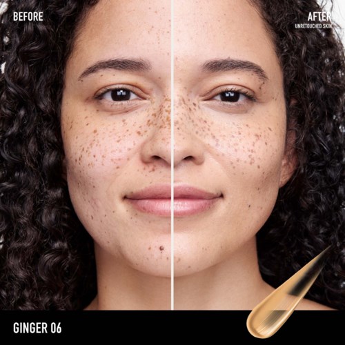 A woman has fewer freckles and clearer skin after using a skin treatment. She has curly hair and a gentle smile.