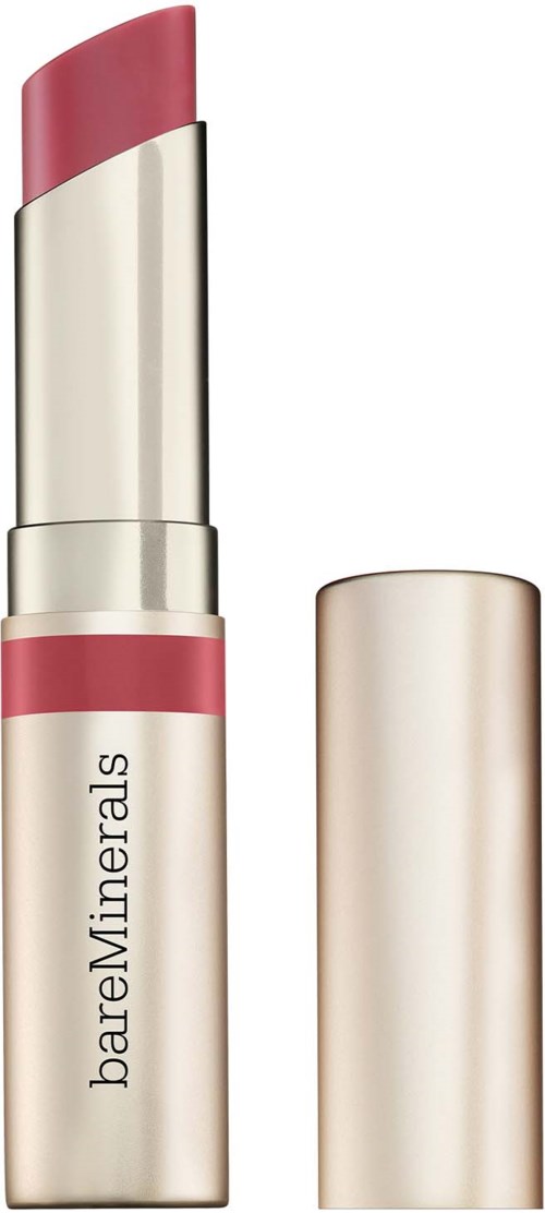 A tube of pink lipstick with its cap removed, showing the lipstick inside.