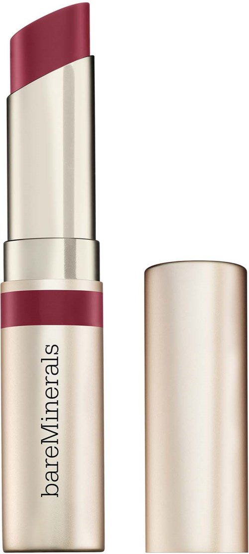 A lipstick with a maroon color, partially twisted up, and the cap is removed, showing the lipstick.