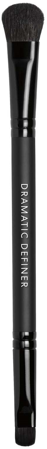 A makeup brush with black handle and soft bristles. The handle has the words "DYNAMIC CINEENER" written on it.