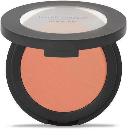 En rund makeup-kompakt med ett grått lock och persikofärgad puder inuti.