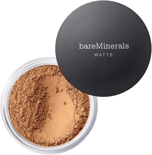 A round container with beige powdered makeup and a black lid with white text that says bareMinerals MATTE.