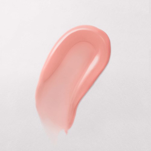 A pinkish, smooth, curved gel or cream spread on a white background.