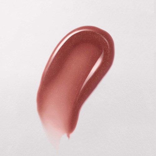 A streak of pinkish gloss on a white background, shaped like a curved brush stroke.