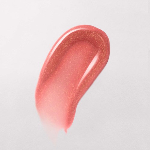 A pink, shimmery nail polish swatch on a white background.