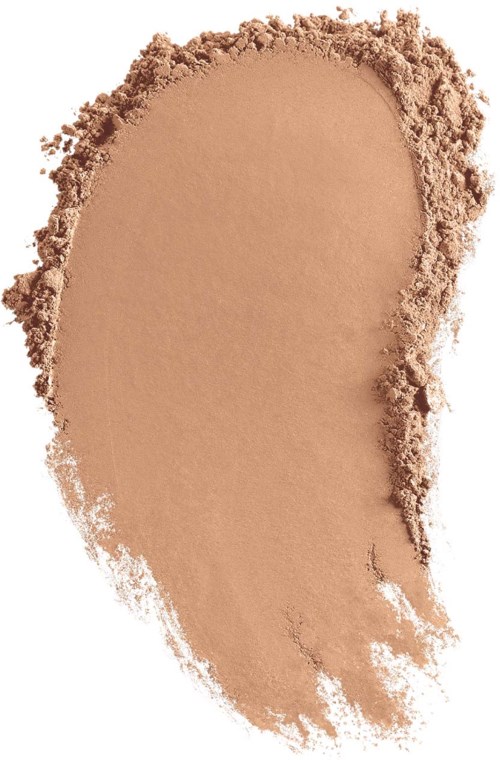 Ein beiges Pulver, verstreut mit ungleichmäßigen Rändern, erinnert an Make-up oder Kosmetik.