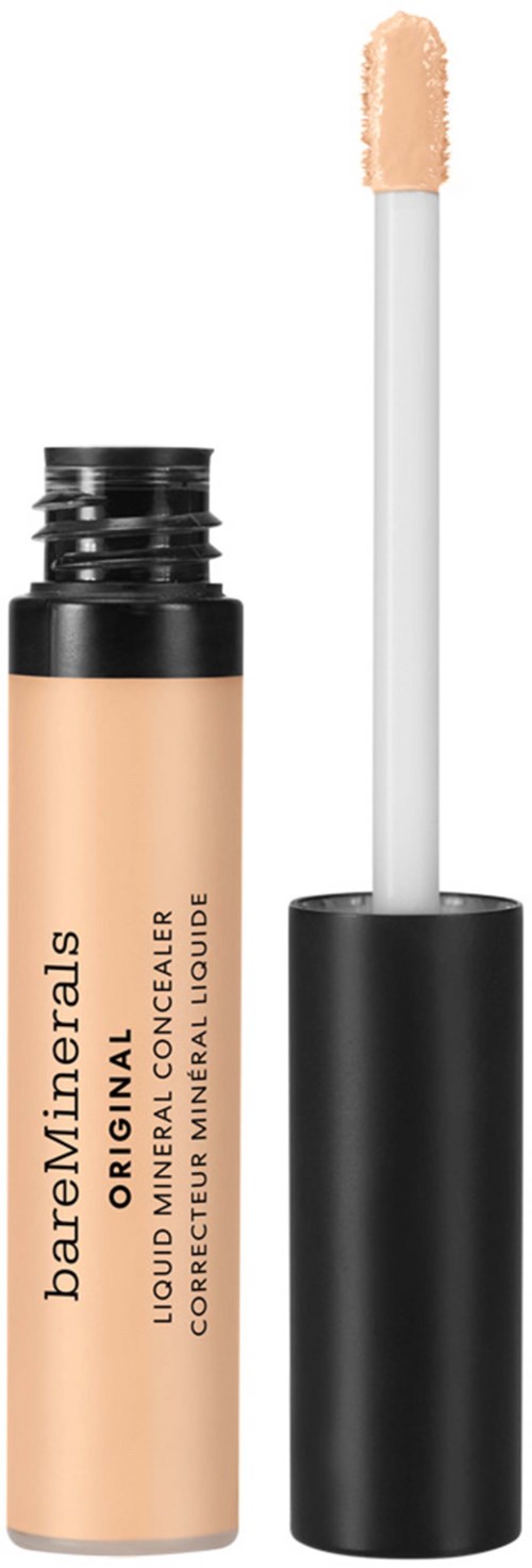 Beige nestemäinen peitevoide putkilossa ja aplikaattorilla ja musta kansi.
