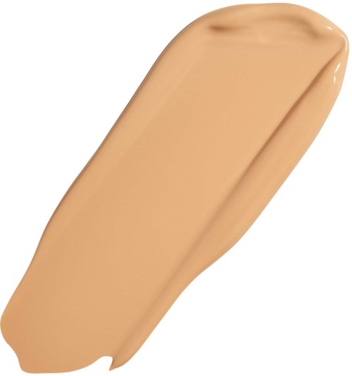 A beige liquid foundation applicator or swatch with smooth texture.