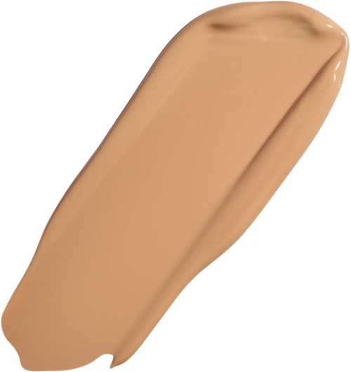 A beige makeup concealer or foundation with a smooth, creamy texture.