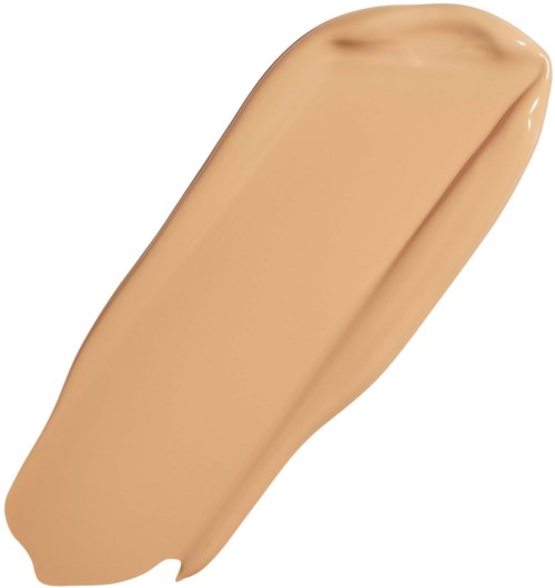 A beige foundation swatch with a smooth, creamy texture and a rounded, slightly angled shape.