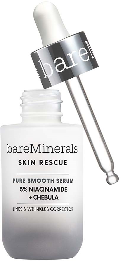 A white bottle of skincare serum with a dropper on top. The label says "bareMinerals Skin Rescue" with ingredients and purpose.