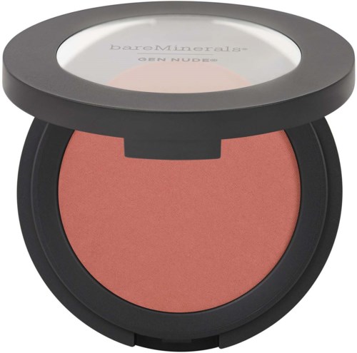 A round blush compact with a black case and a clear lid, revealing pinkish blush inside.