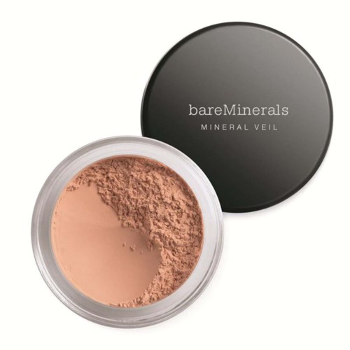 A round container with peach-colored powder inside, black lid with white text, for mineral makeup.
