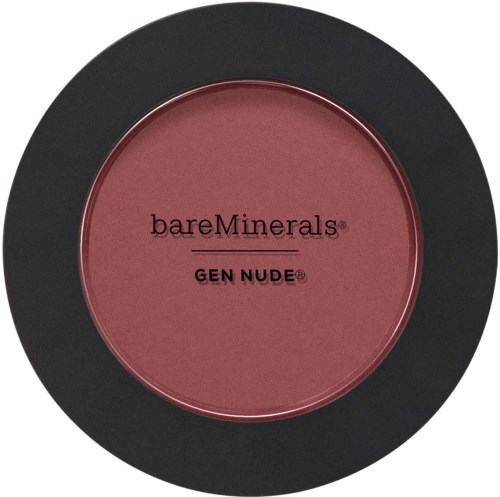 En rund makeuppuderbehållare med svart yttre kant och rosaaktig färg inuti. Etiketten säger 'bareMinerals GEN NUDE'.