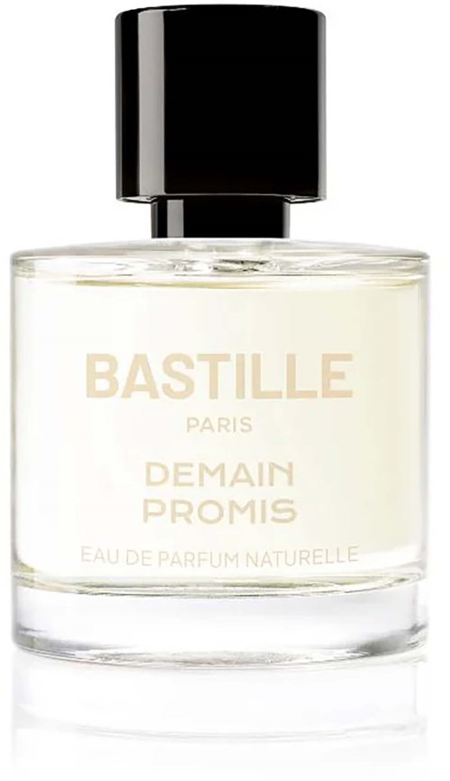 En tydlig parfymflaska med svart lock, märkt Bastille Demain Promis Paris.