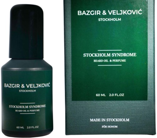 A green box and a black bottle of beard oil and perfume from Bazgyr & Veljkovic, Stockholm Syndrome.