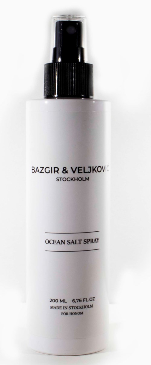A white spray bottle labeled 'Ocean Salt Spray' from Bazgi & Veljkov, Stockholm, 200ml.