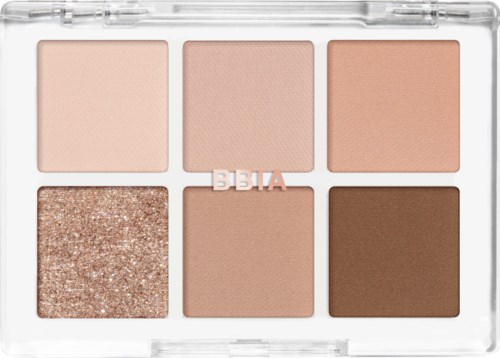 Een palet met zes tinten beige en bruin, inclusief mat en glitter afwerkingen, in een doorzichtige case.