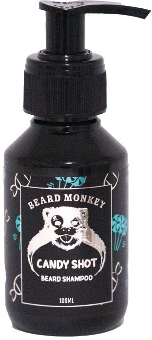 Black bottle with a pump, labeled 'Beard Monkey Candy Shot Beard Shampoo,' featuring a monkey face illustration.