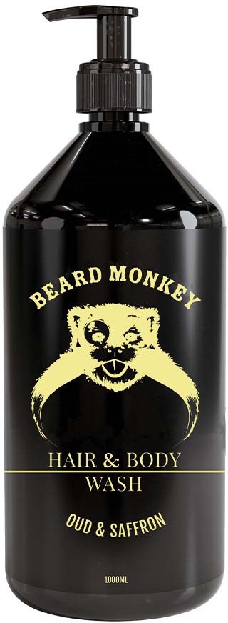 Eine schwarze Flasche mit Pumpspender, beschriftet 'Beard Monkey Hair & Body Wash' in Gelb, mit Affengesichtzeichnung.