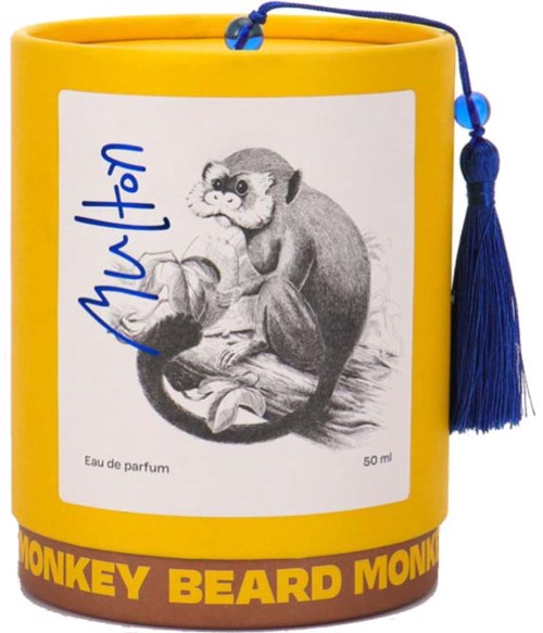A yellow container for perfume with a monkey illustration and the text 'Monkey Beard Mon'.
